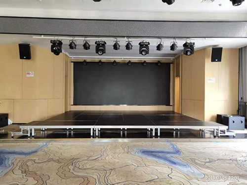 Stage floor material installation methods